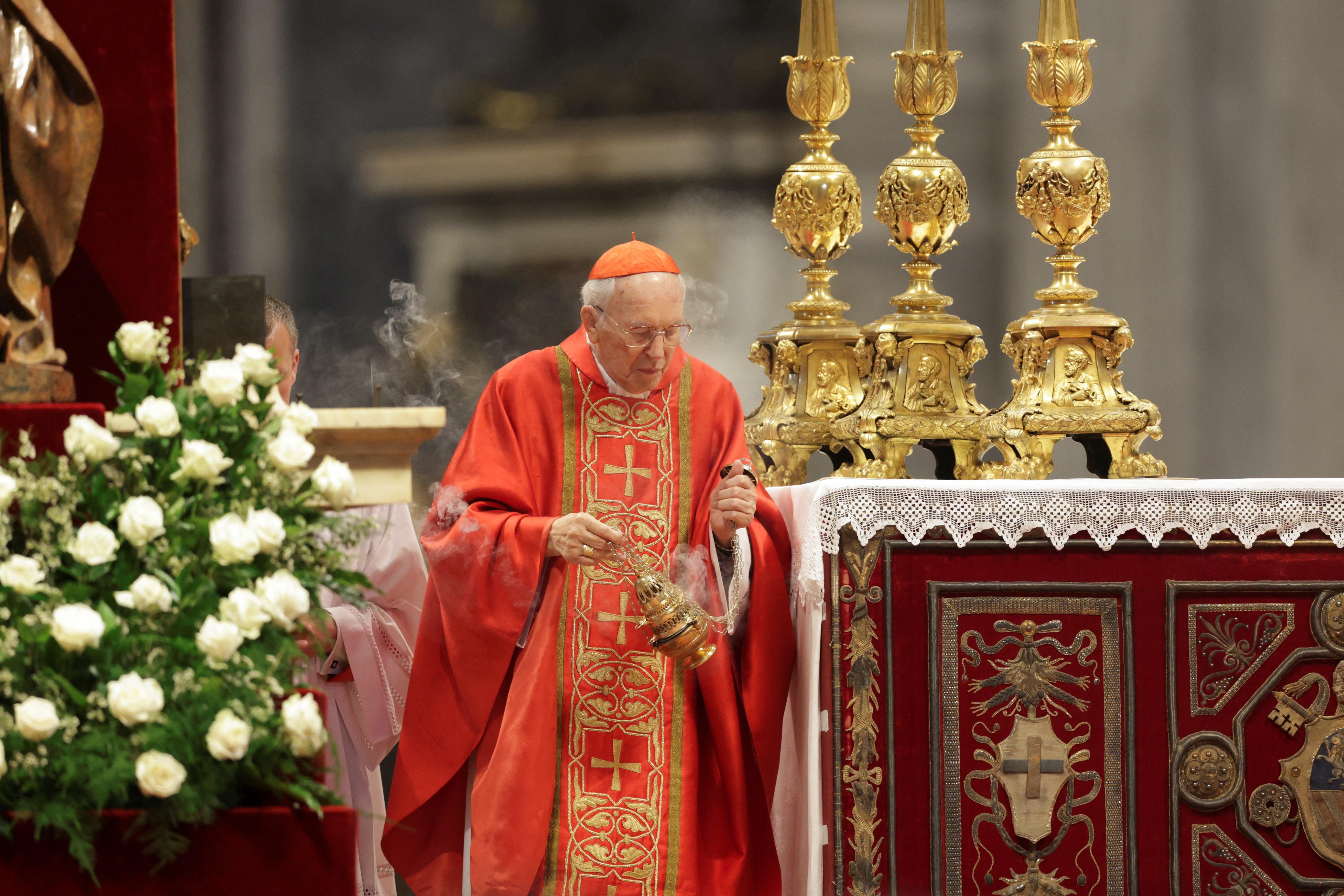 The Dean of the College of Cardinals, Cardinal Giovanni Battista Re presides over the Holy Mass celebrated for the election of the new pope