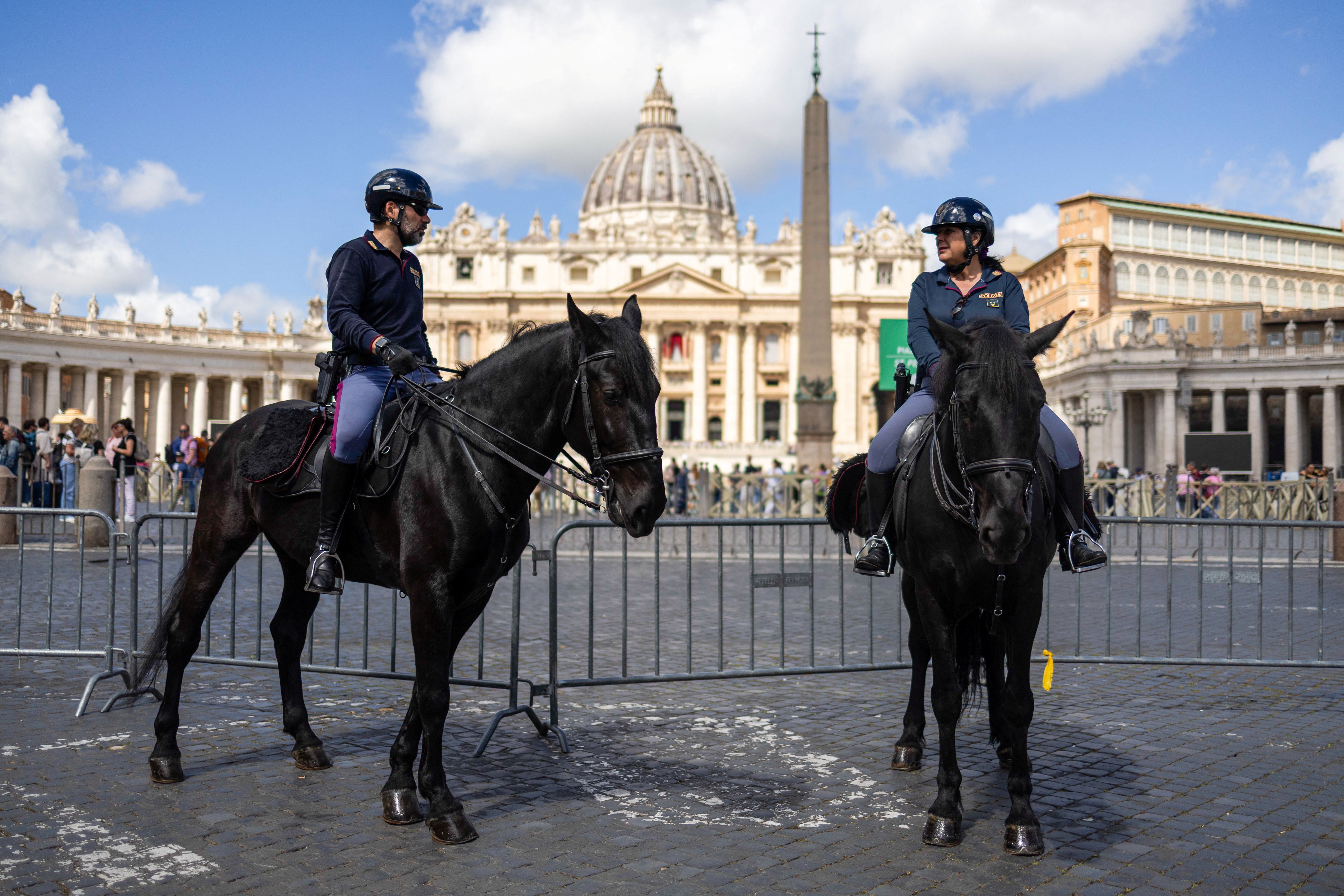 Mounted police stand near St. Peter's Square, pictured on Tuesday