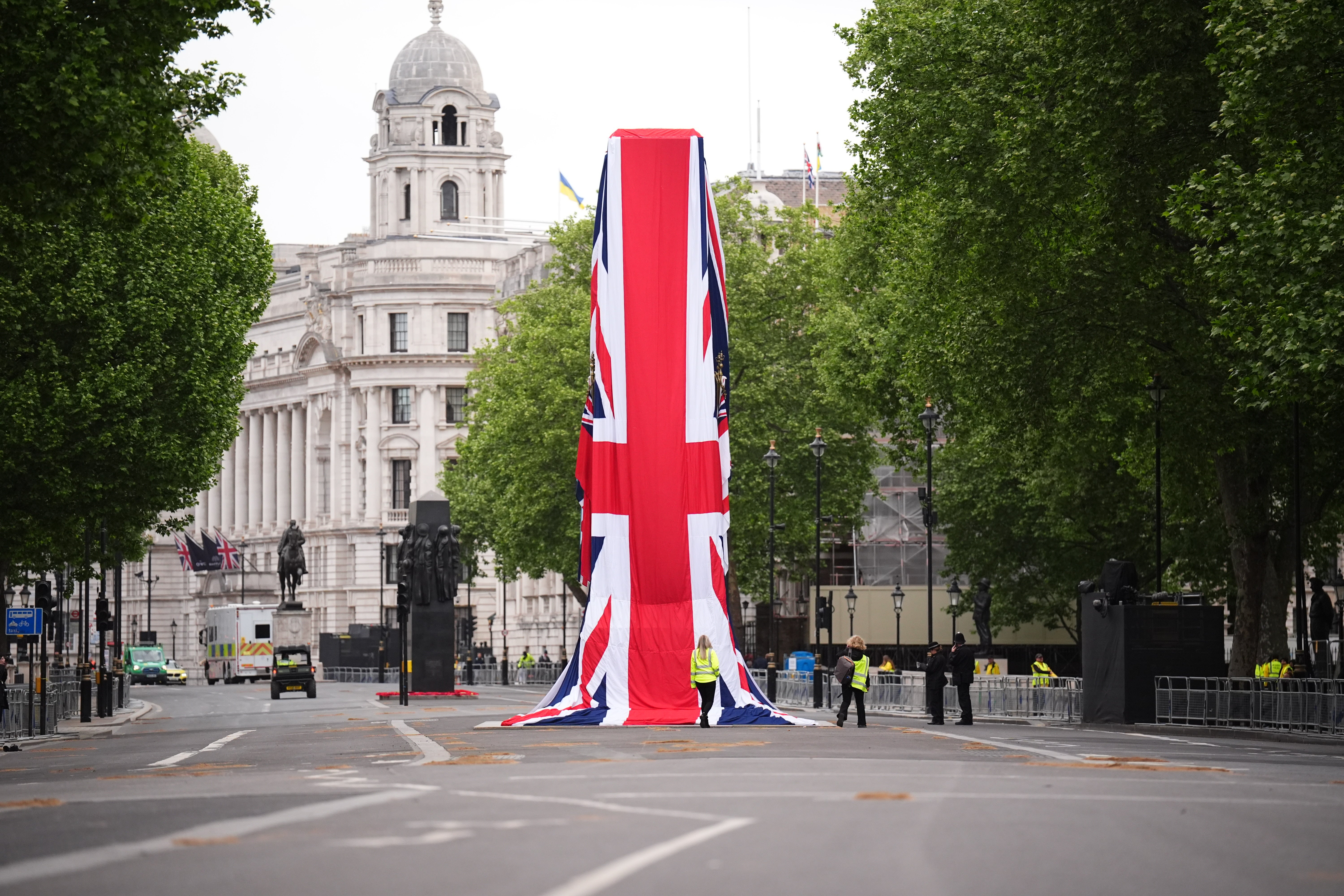 The Cenotaph on Whitehall is dressed in the Union flag