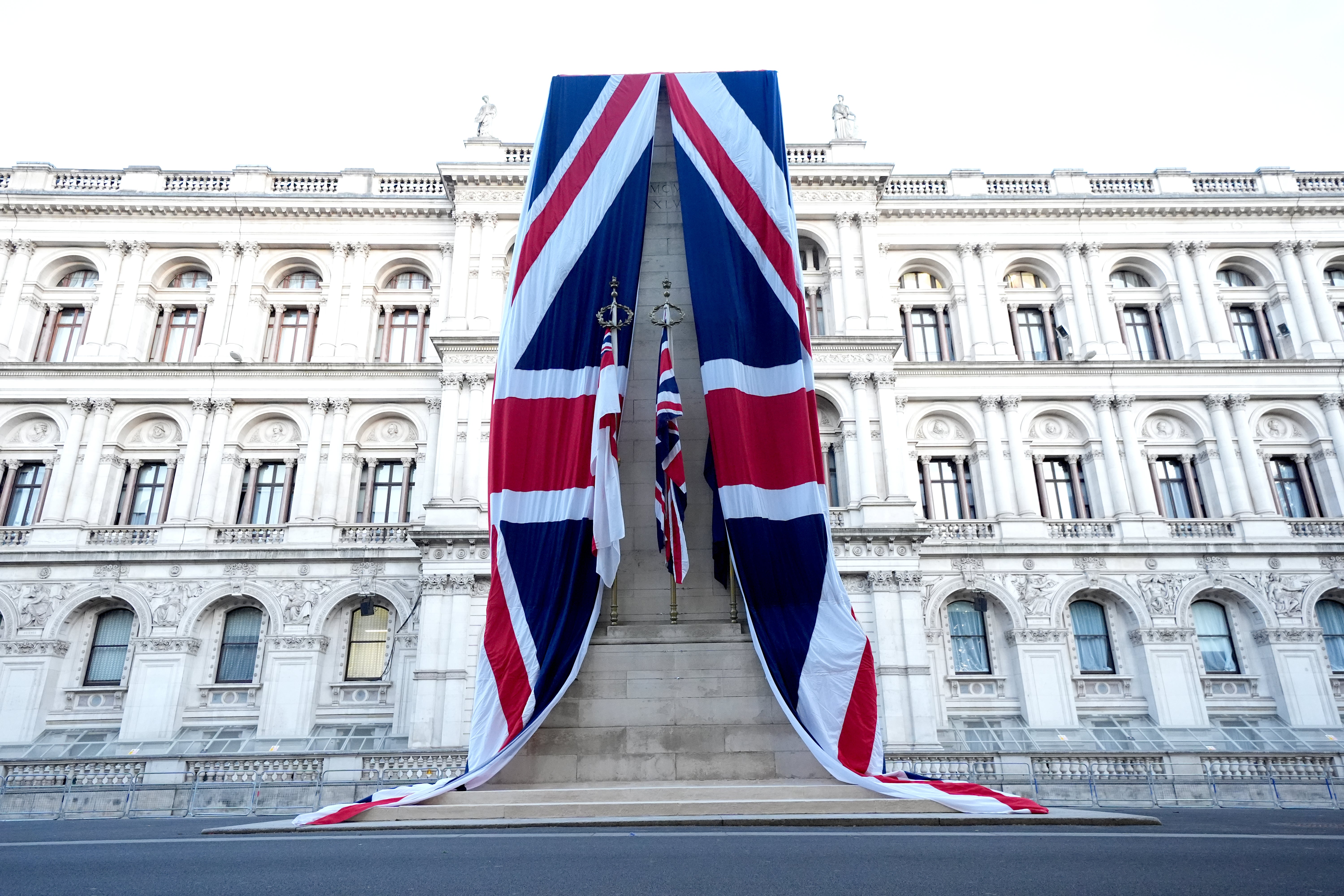 It is the first time the war memorial has been draped in Union flags since it was unveiled by King George V more than a century ago, in 1920